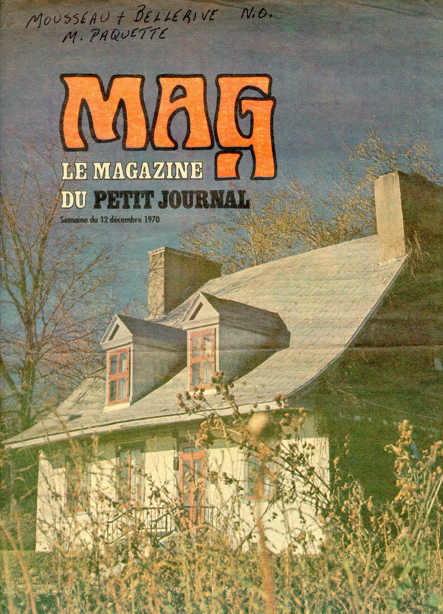 Maison en pierre avec 2 lucarnes dans un magazine